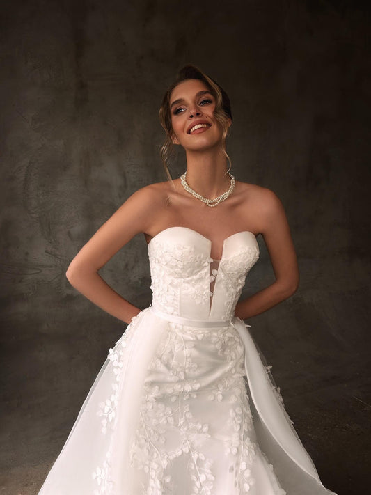 BIBLIS – Strapless Mermaid Wedding Dress with 3D Floral Appliqués and Tulle Train