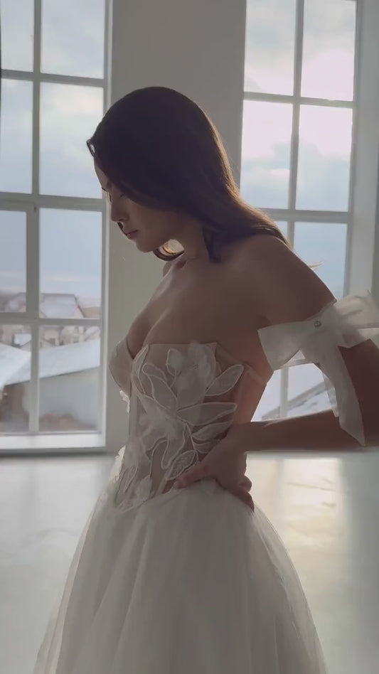 AMORTENTIA – Floral Off-Shoulder Ball gown Wedding Dress with Sheer Corset and Ribbons