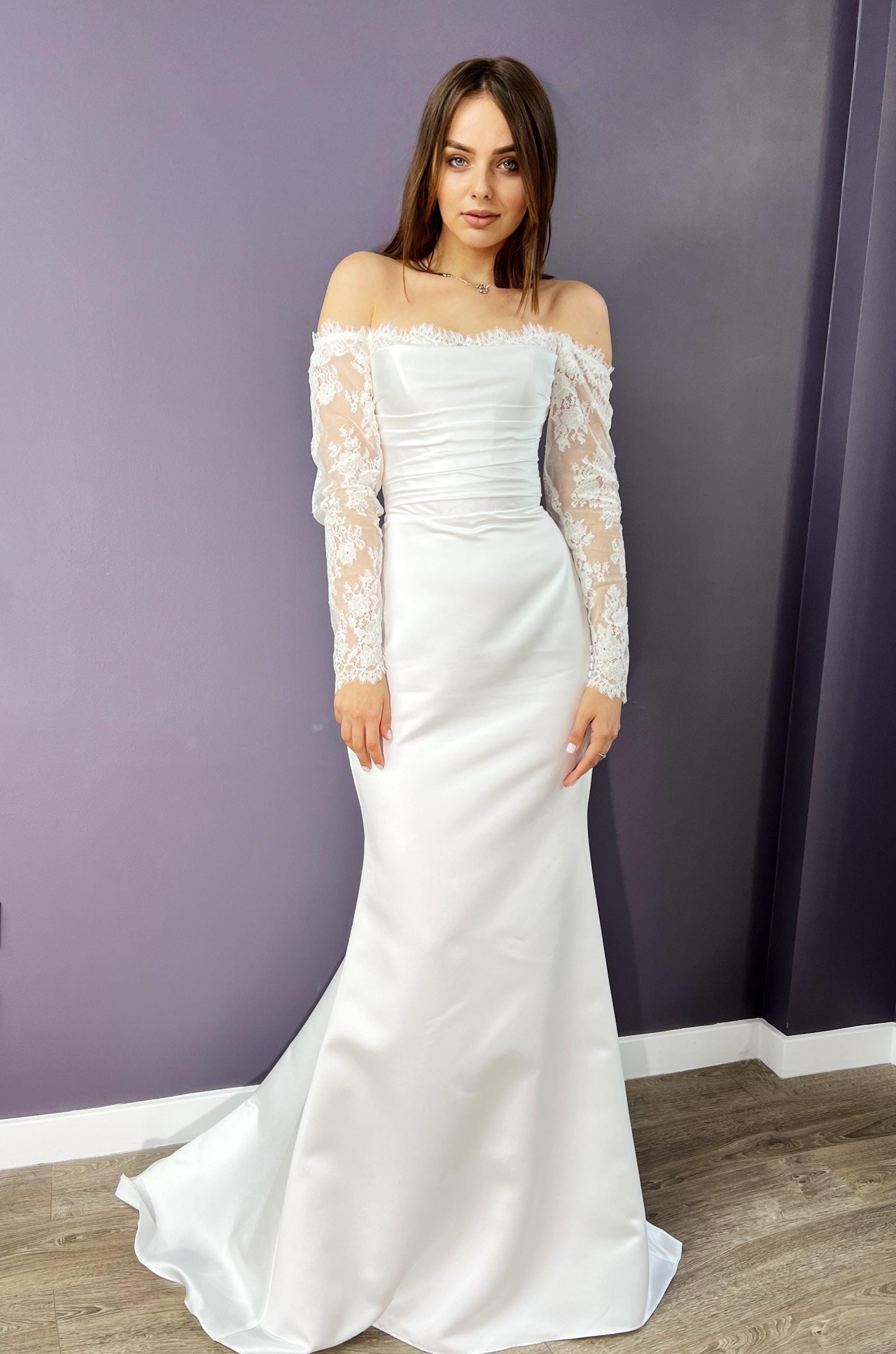Elegant satin Off-Shoulder Lace Sleeve Bridal Gown with Classic Corset & Train. Open low back wedding delicate dress
