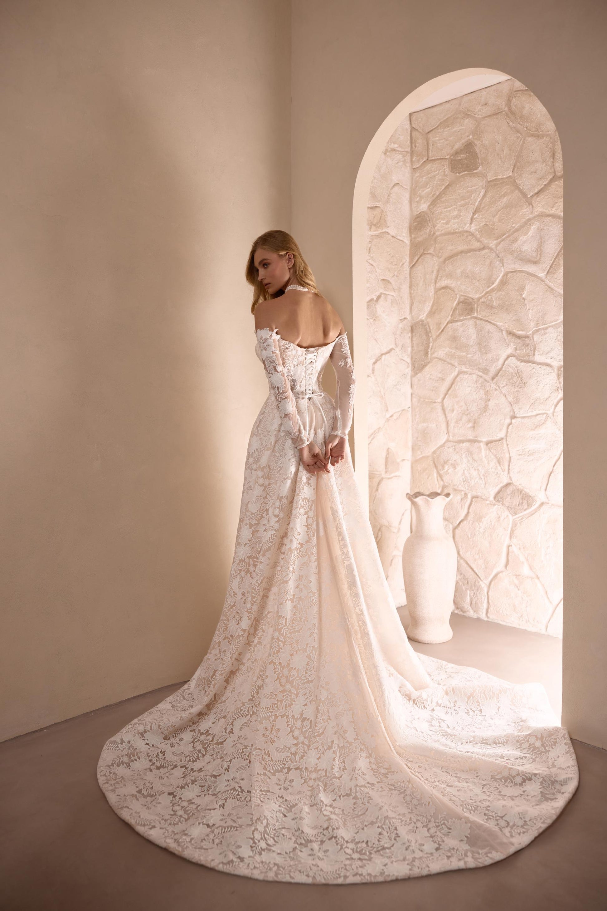 Off-Shoulder Floral Lace Wedding Dress with Long Sleeves and Elegant Sweetheart Neckline Perfect Boho Bridal Gown with a Luxurious Train