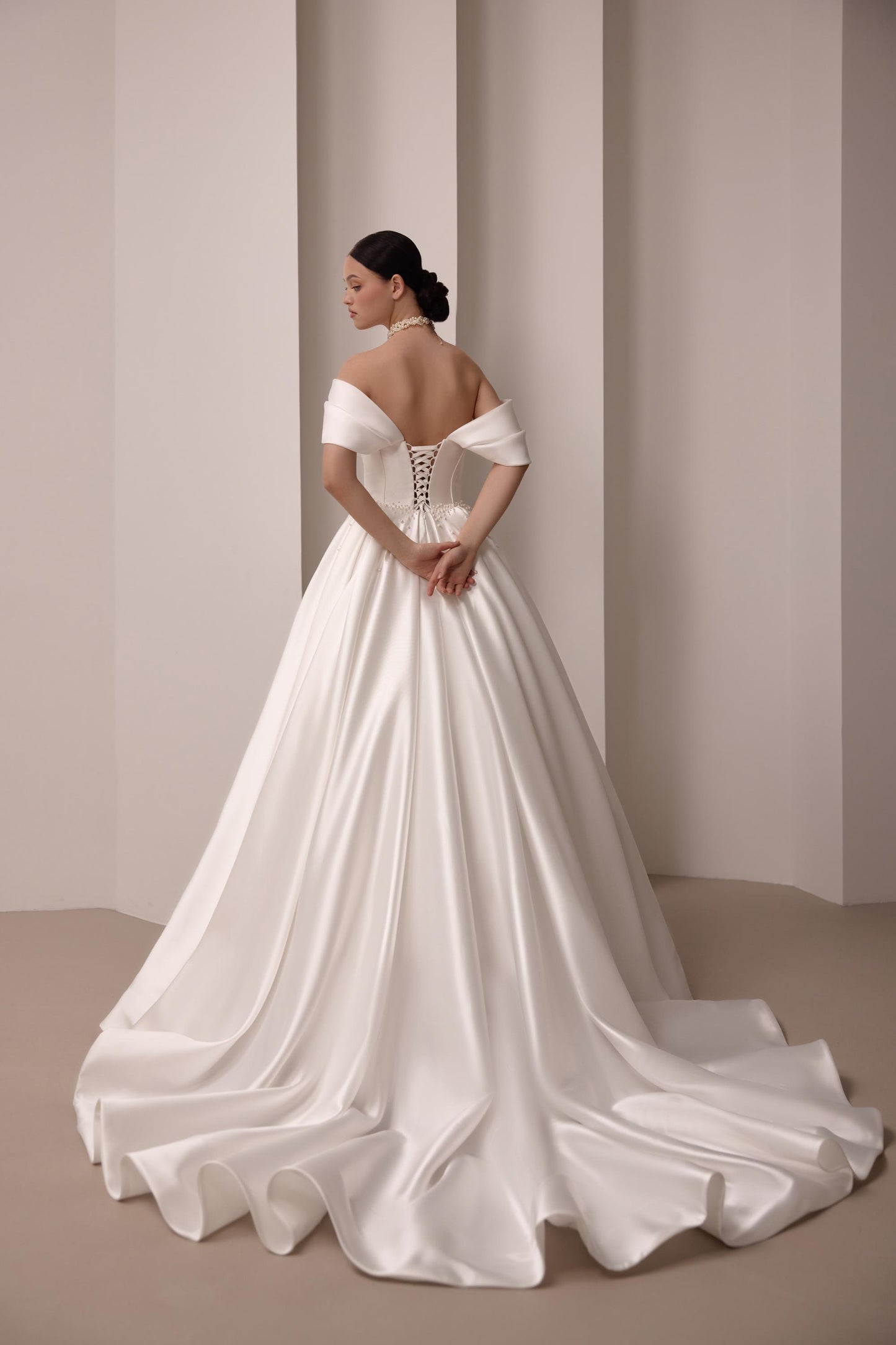 Luxurious Satin Off-Shoulder Wedding Gown with Corset Top, Pearls Detailing, and Elegant Train | Princess & Fairy Style Bridal Dress