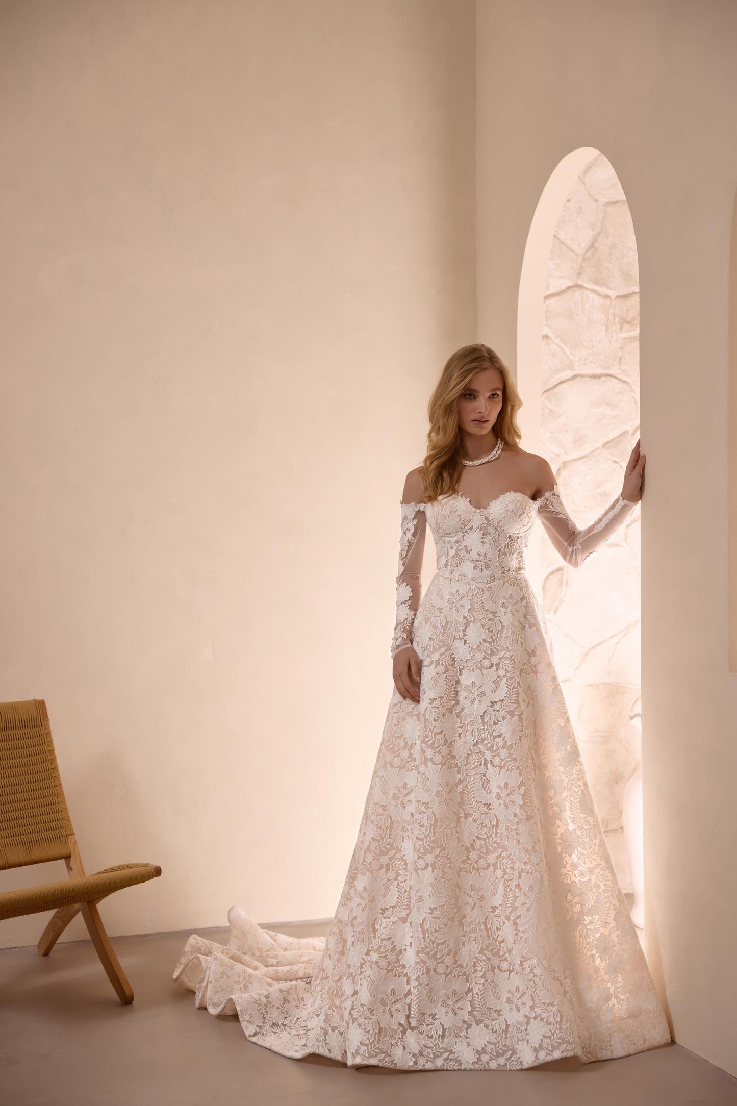 Off-Shoulder Floral Lace Wedding Dress with Long Sleeves and Elegant Sweetheart Neckline Perfect Boho Bridal Gown with a Luxurious Train