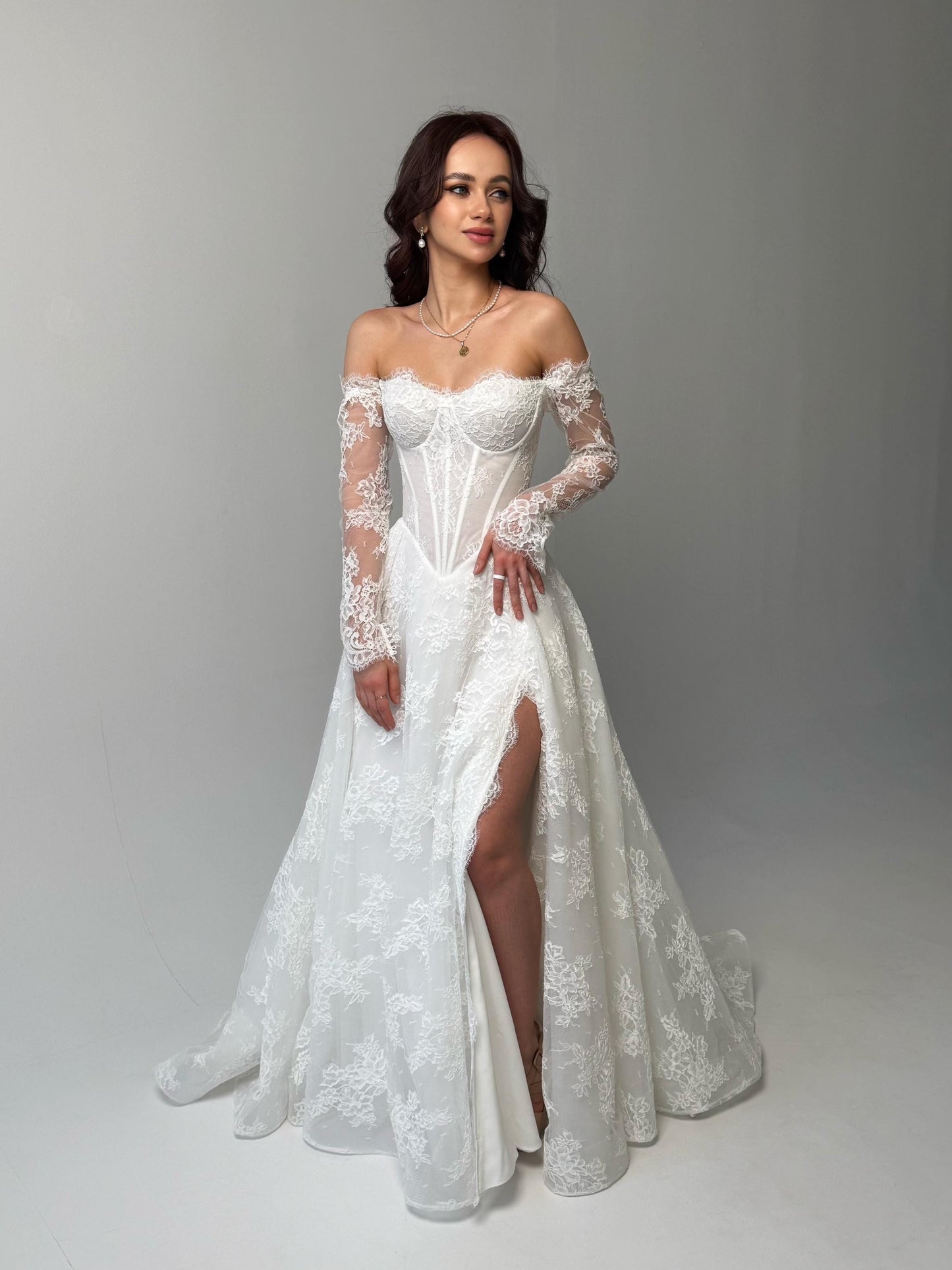 Elegant Off-Shoulder white Bridal Gown with Delicate Lace, Timeless column Wedding Dress with Corset Back and Long lace Sleeves a-line dress