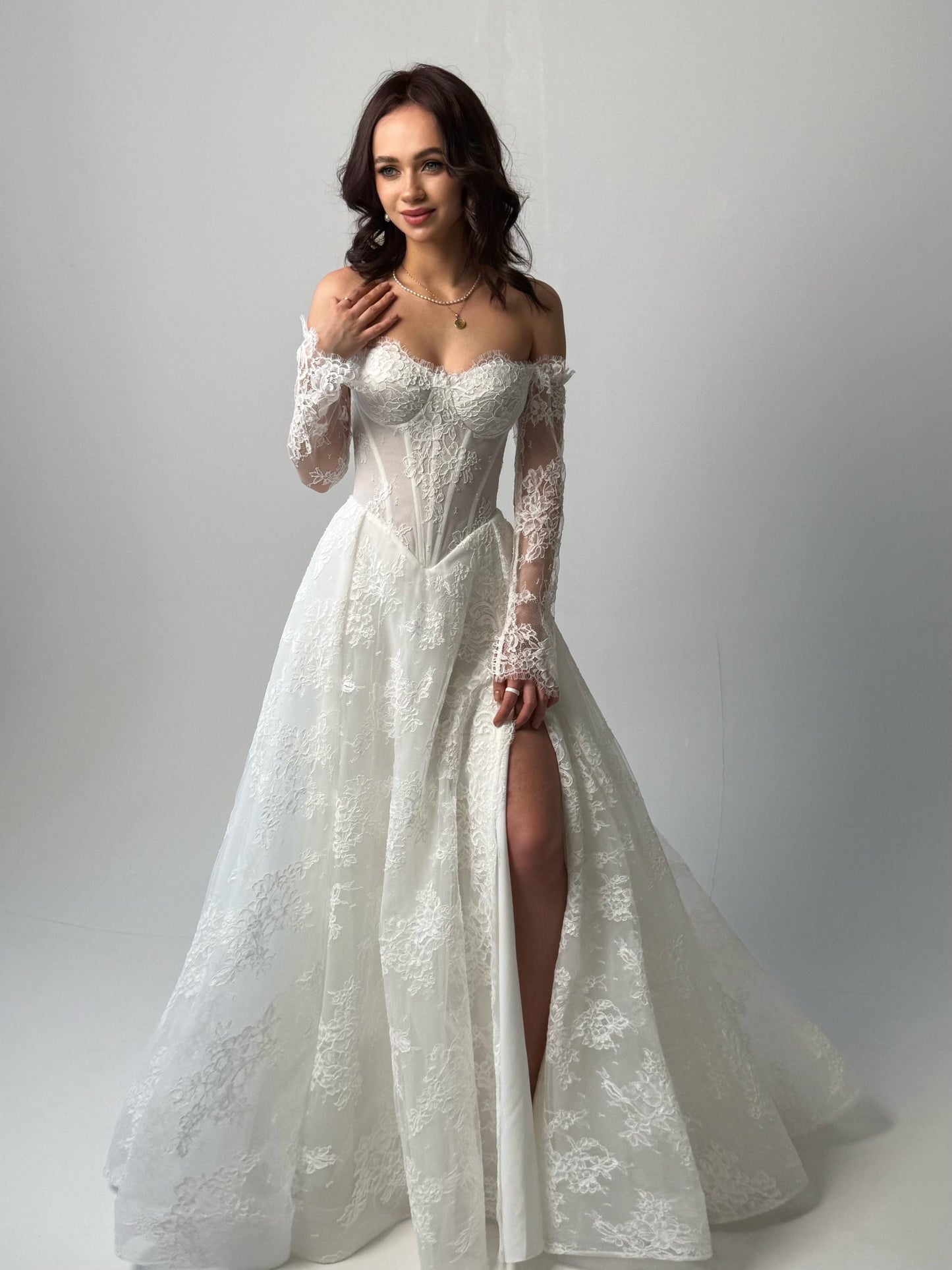 Elegant Off-Shoulder white Bridal Gown with Delicate Lace, Timeless column Wedding Dress with Corset Back and Long lace Sleeves a-line dress