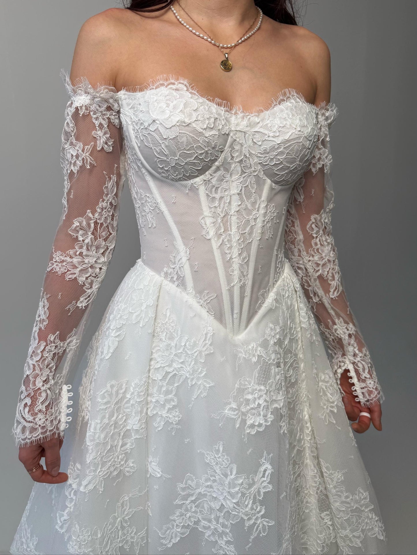 Elegant Off-Shoulder white Bridal Gown with Delicate Lace, Timeless column Wedding Dress with Corset Back and Long lace Sleeves a-line dress