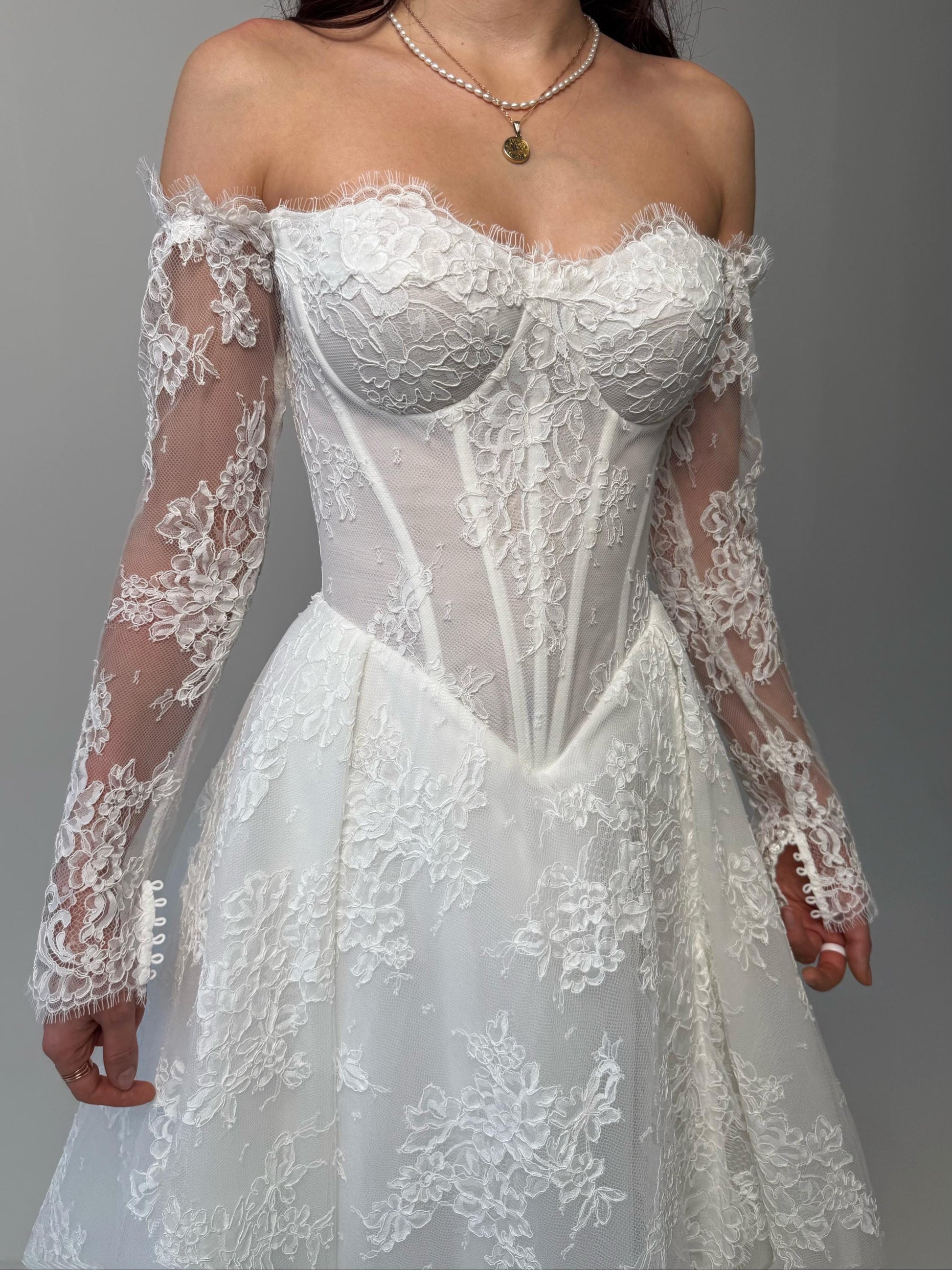 Elegant Off-Shoulder white Bridal Gown with Delicate Lace, Timeless column Wedding Dress with Corset Back and Long lace Sleeves a-line dress