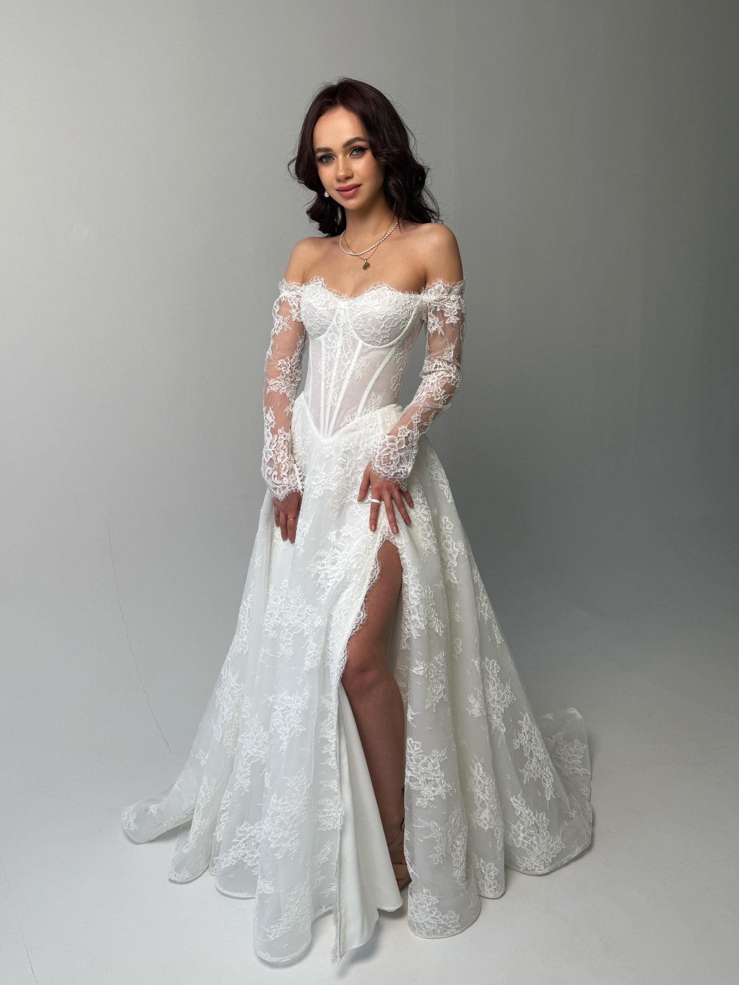 Elegant Off-Shoulder white Bridal Gown with Delicate Lace, Timeless column Wedding Dress with Corset Back and Long lace Sleeves a-line dress
